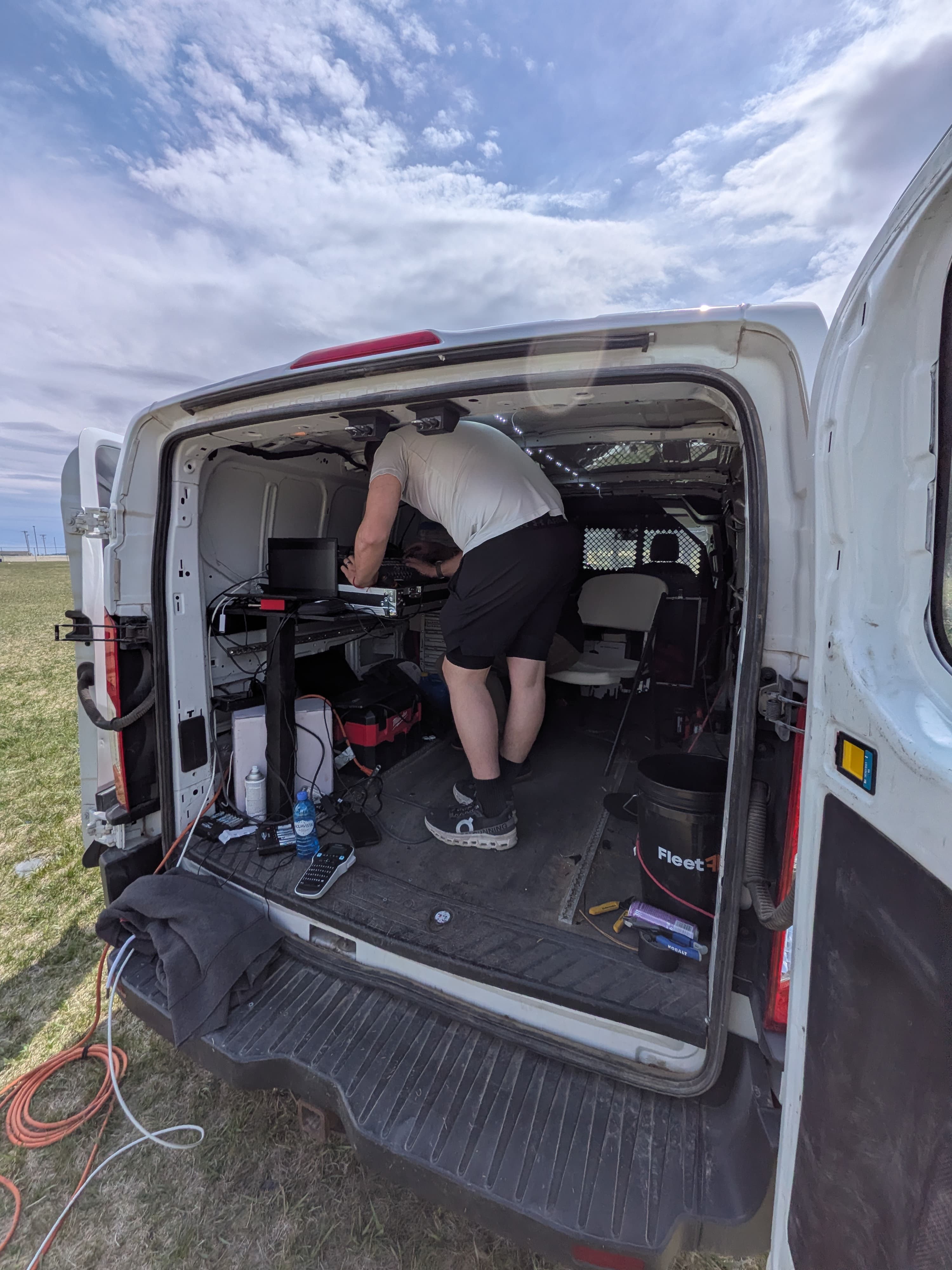 Brink Productions production van with full audio and mixing equipment at an outdoor event